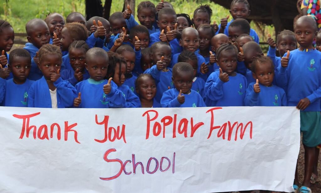 Children from Freetown wearing their new uniform