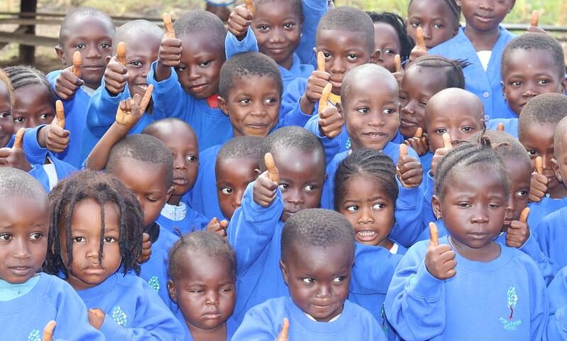 Children from Freetown wearing their new uniform